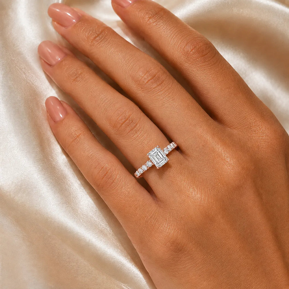 Elegant Solitaire Ring with Graduated Accent Stones