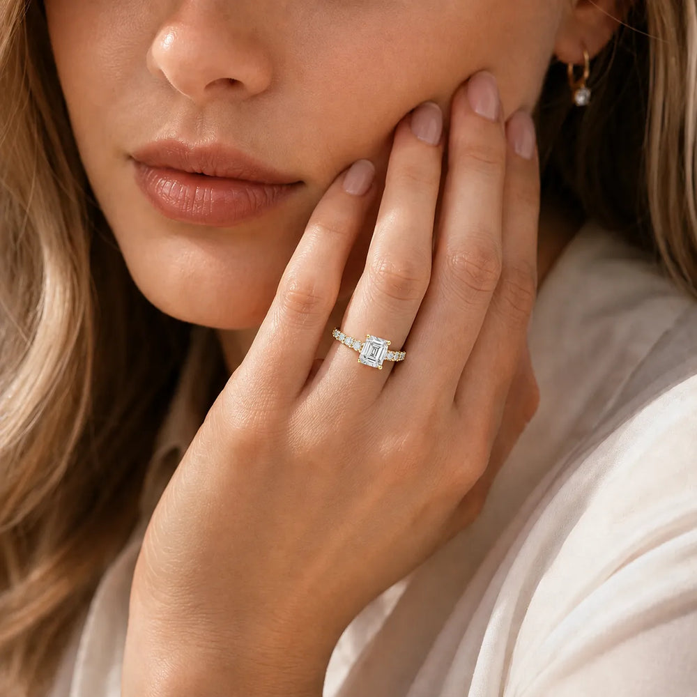 Elegant Solitaire Ring with Graduated Accent Stones