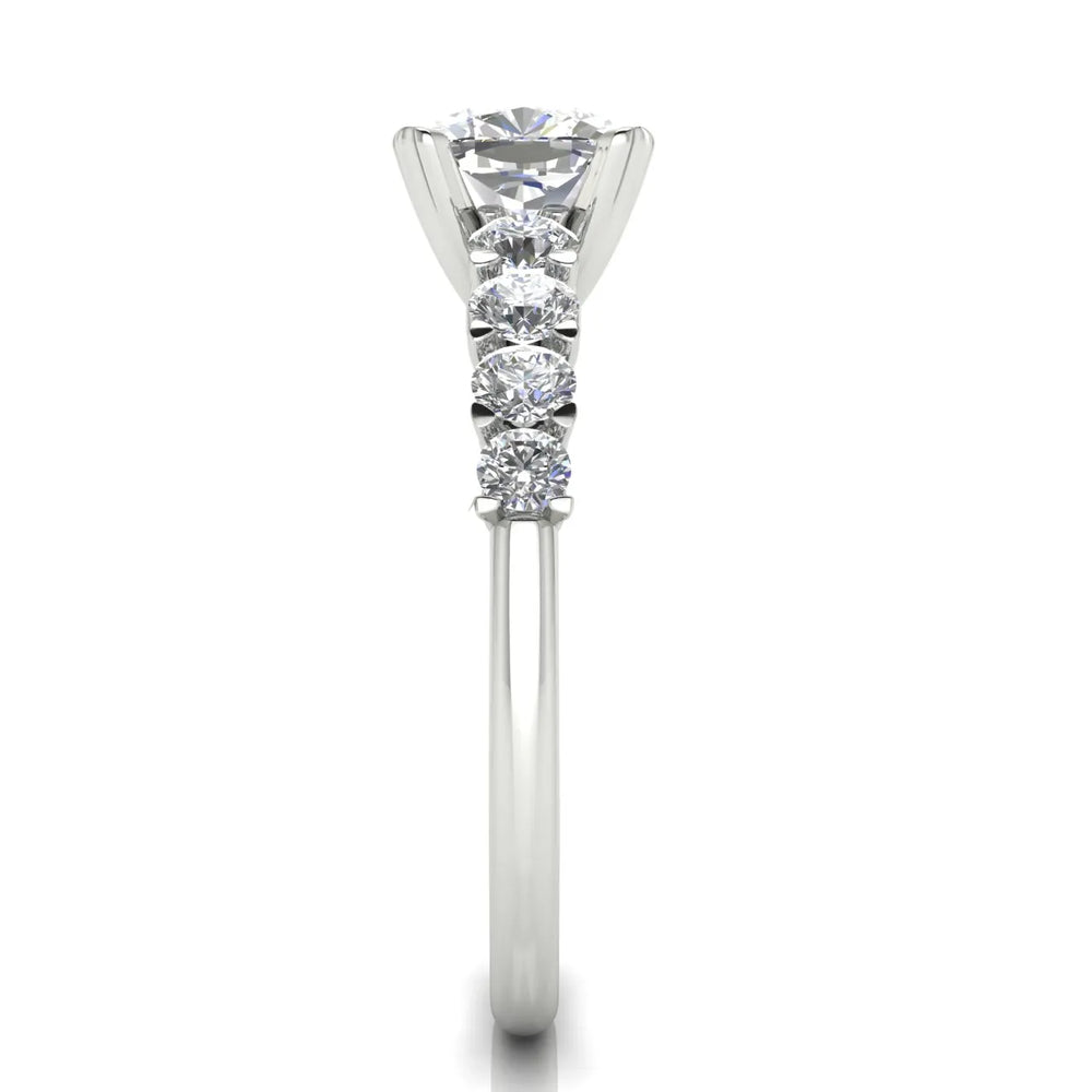 Elegant Solitaire Ring with Graduated Accent Stones