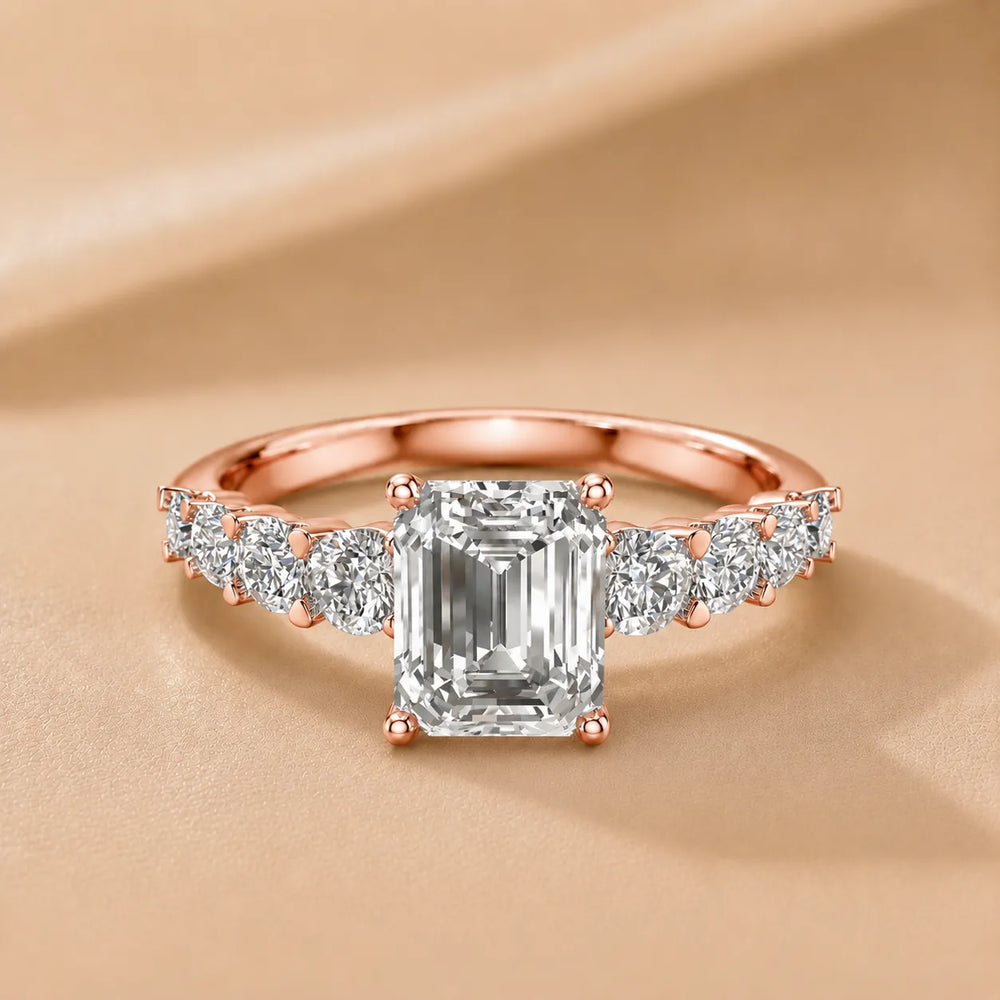 Elegant Solitaire Ring with Graduated Accent Stones