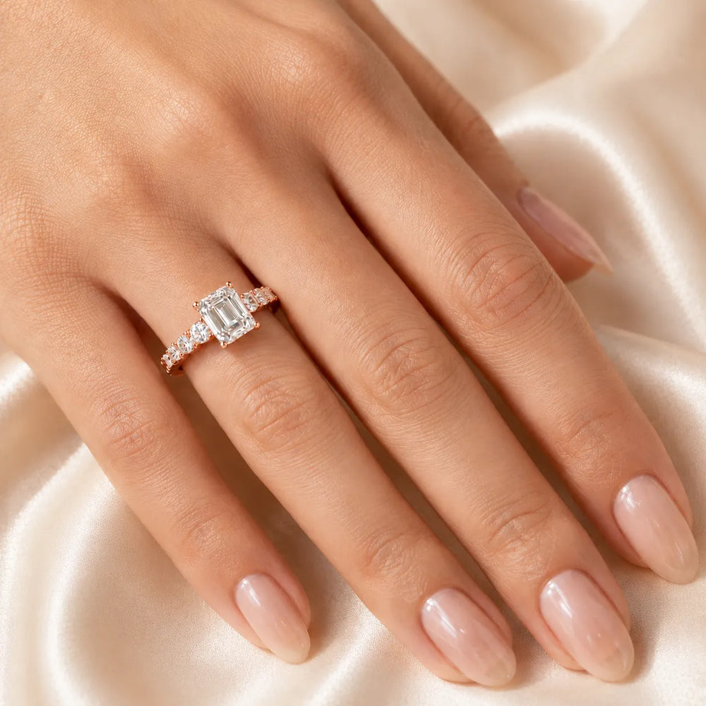 Elegant Solitaire Ring with Graduated Accent Stones
