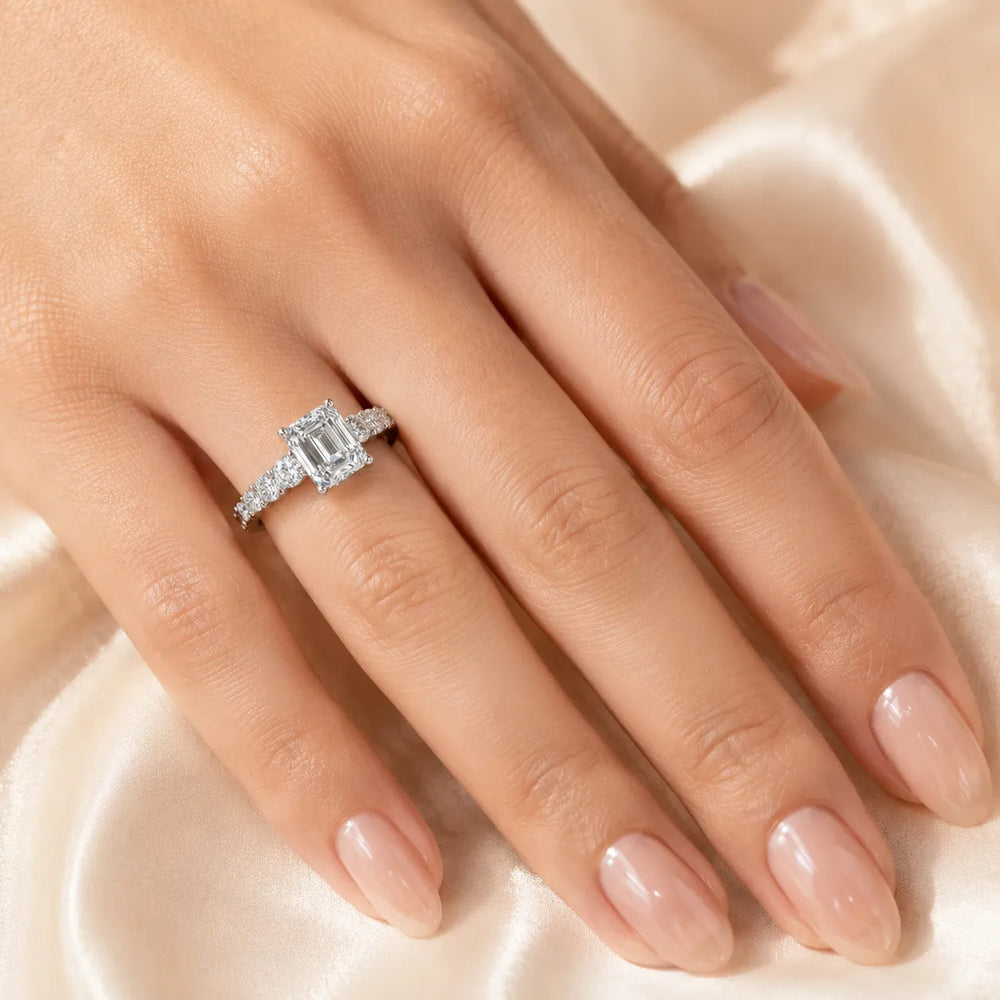 Elegant Solitaire Ring with Graduated Accent Stones