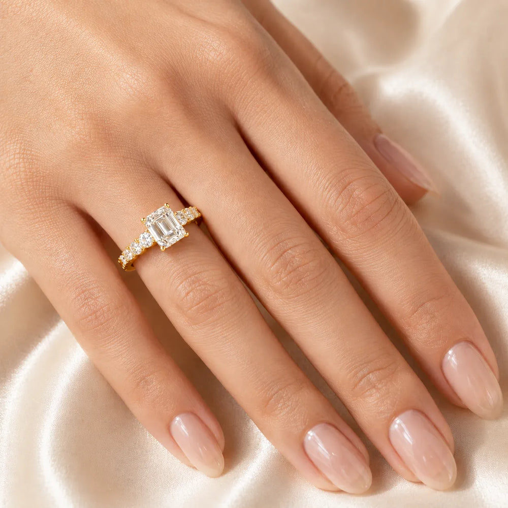 Elegant Solitaire Ring with Graduated Accent Stones