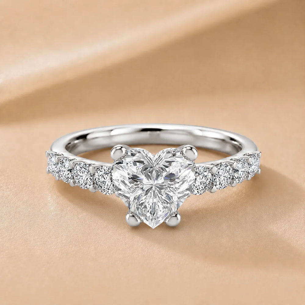 Elegant Solitaire Ring with Graduated Accent Stones