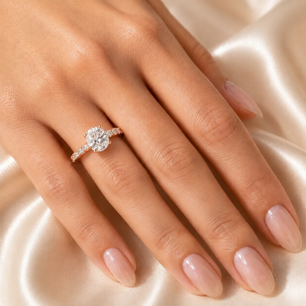 Elegant Solitaire Ring with Graduated Accent Stones
