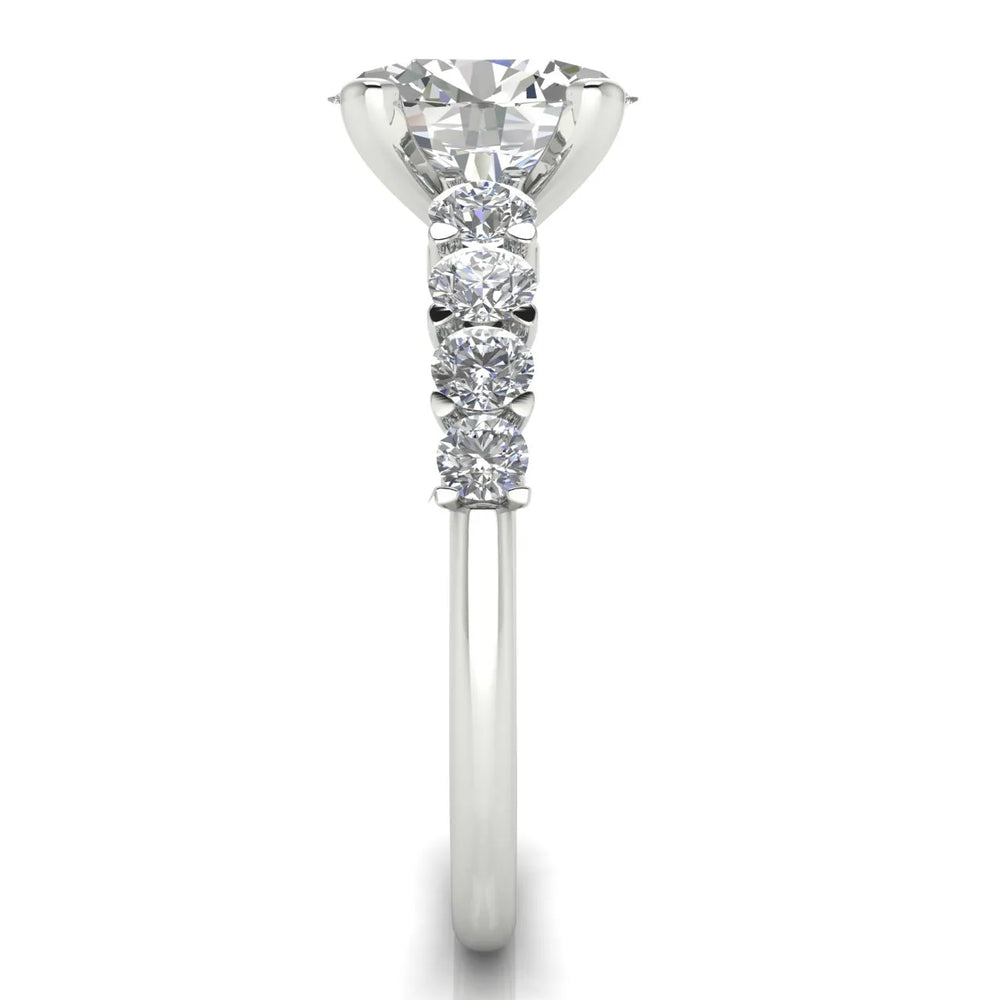 Elegant Solitaire Ring with Graduated Accent Stones