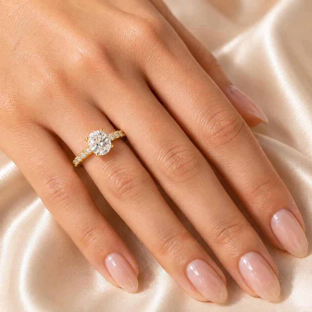 Elegant Solitaire Ring with Graduated Accent Stones