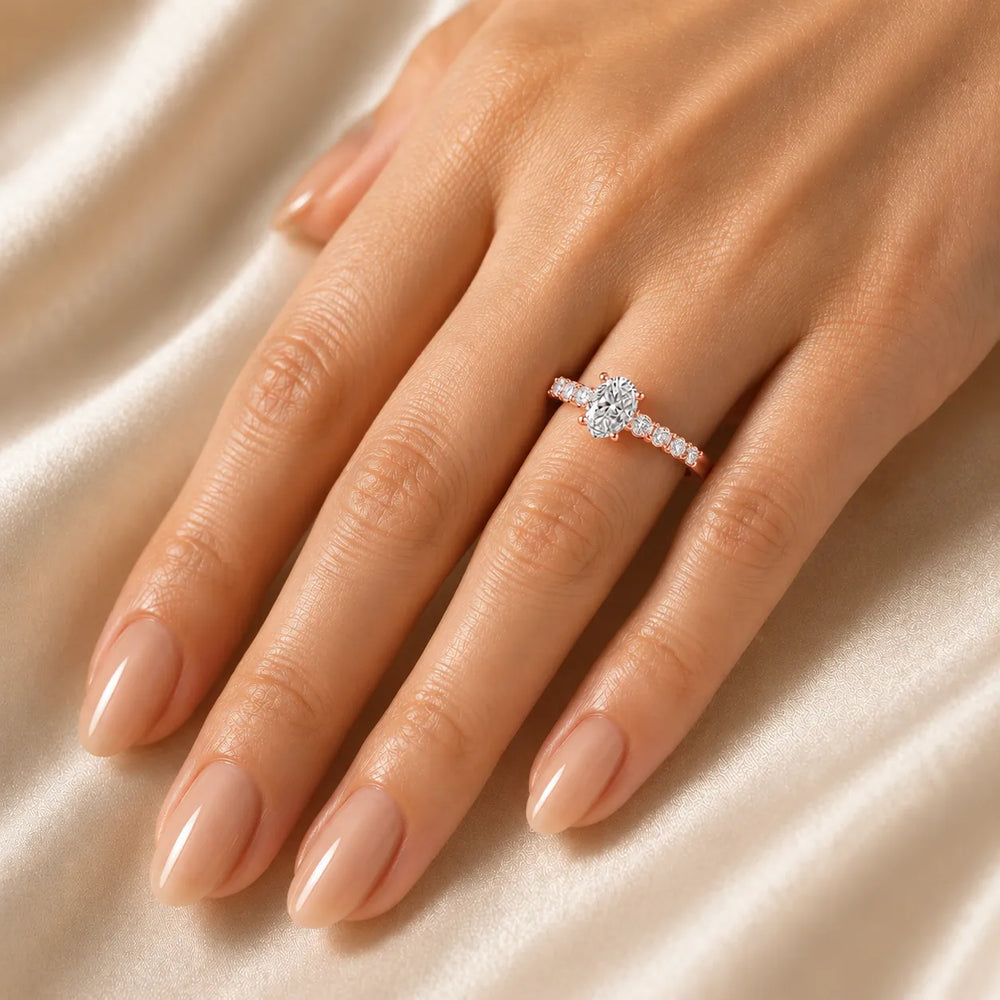 Elegant Solitaire Ring with Graduated Accent Stones