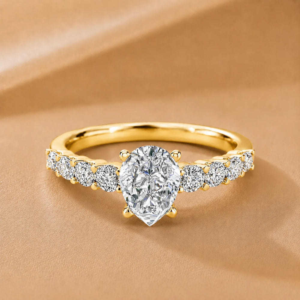 Elegant Solitaire Ring with Graduated Accent Stones
