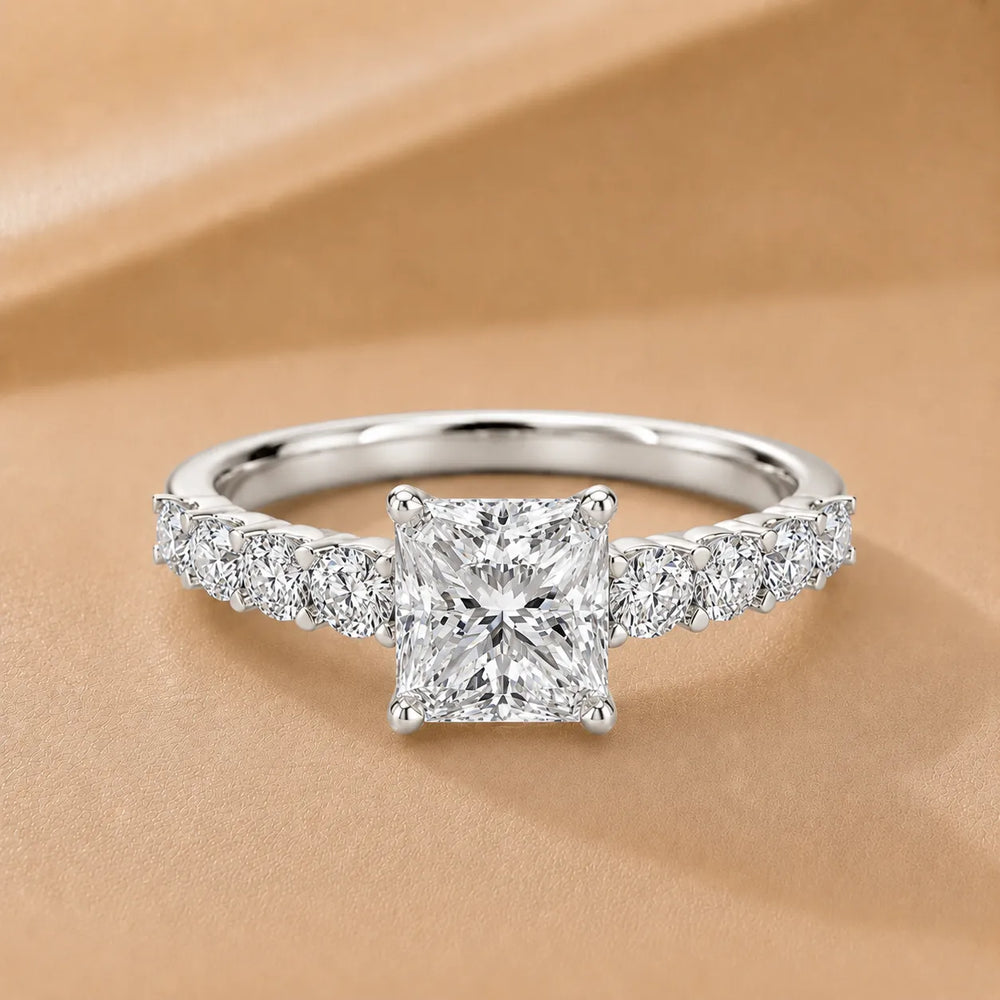 Elegant Solitaire Ring with Graduated Accent Stones