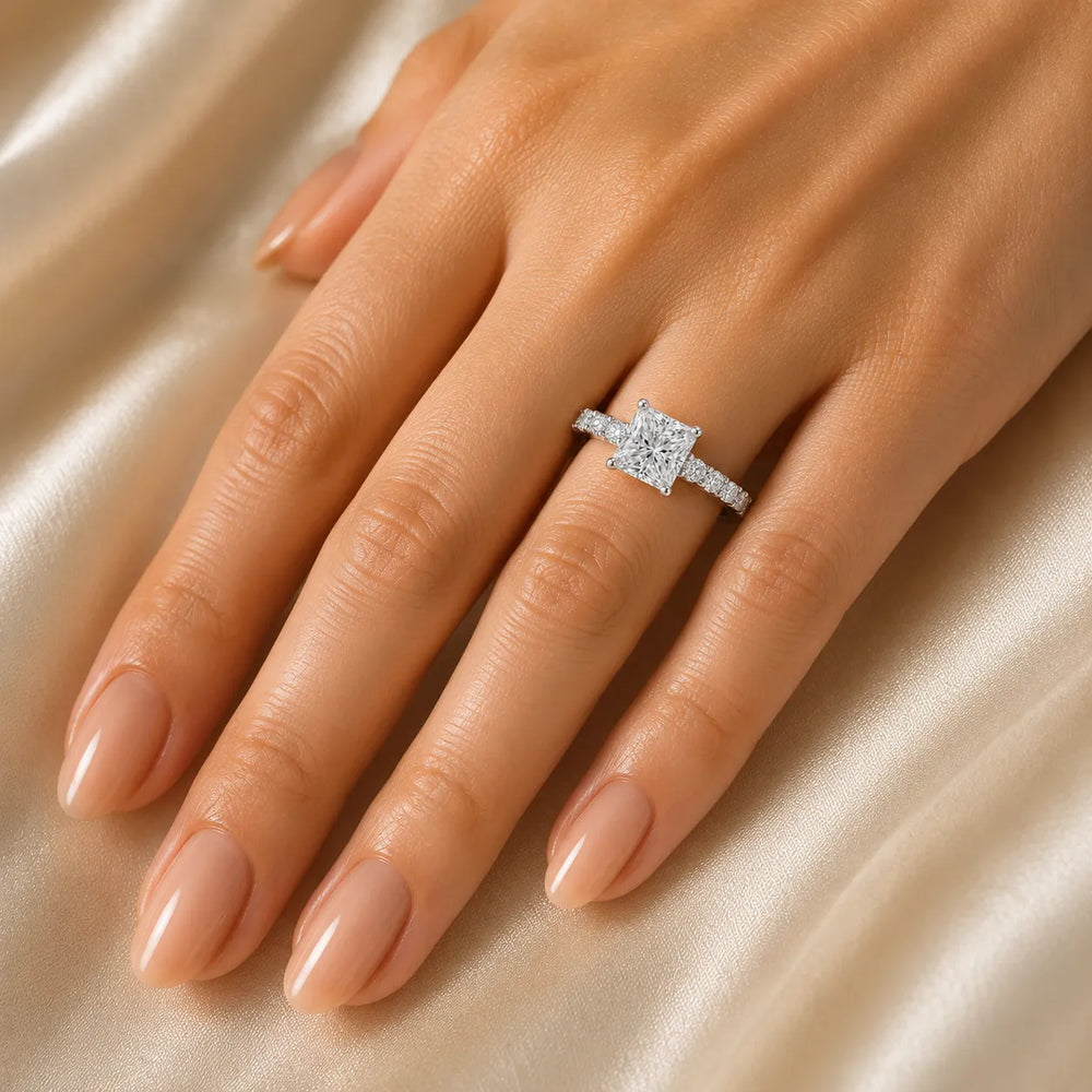 Elegant Solitaire Ring with Graduated Accent Stones
