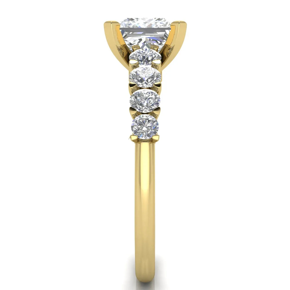 Elegant Solitaire Ring with Graduated Accent Stones