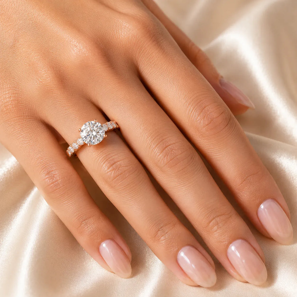 Elegant Solitaire Ring with Graduated Accent Stones