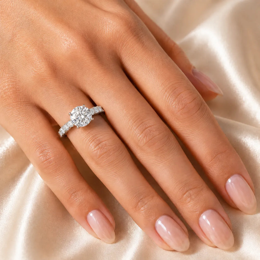 Elegant Solitaire Ring with Graduated Accent Stones