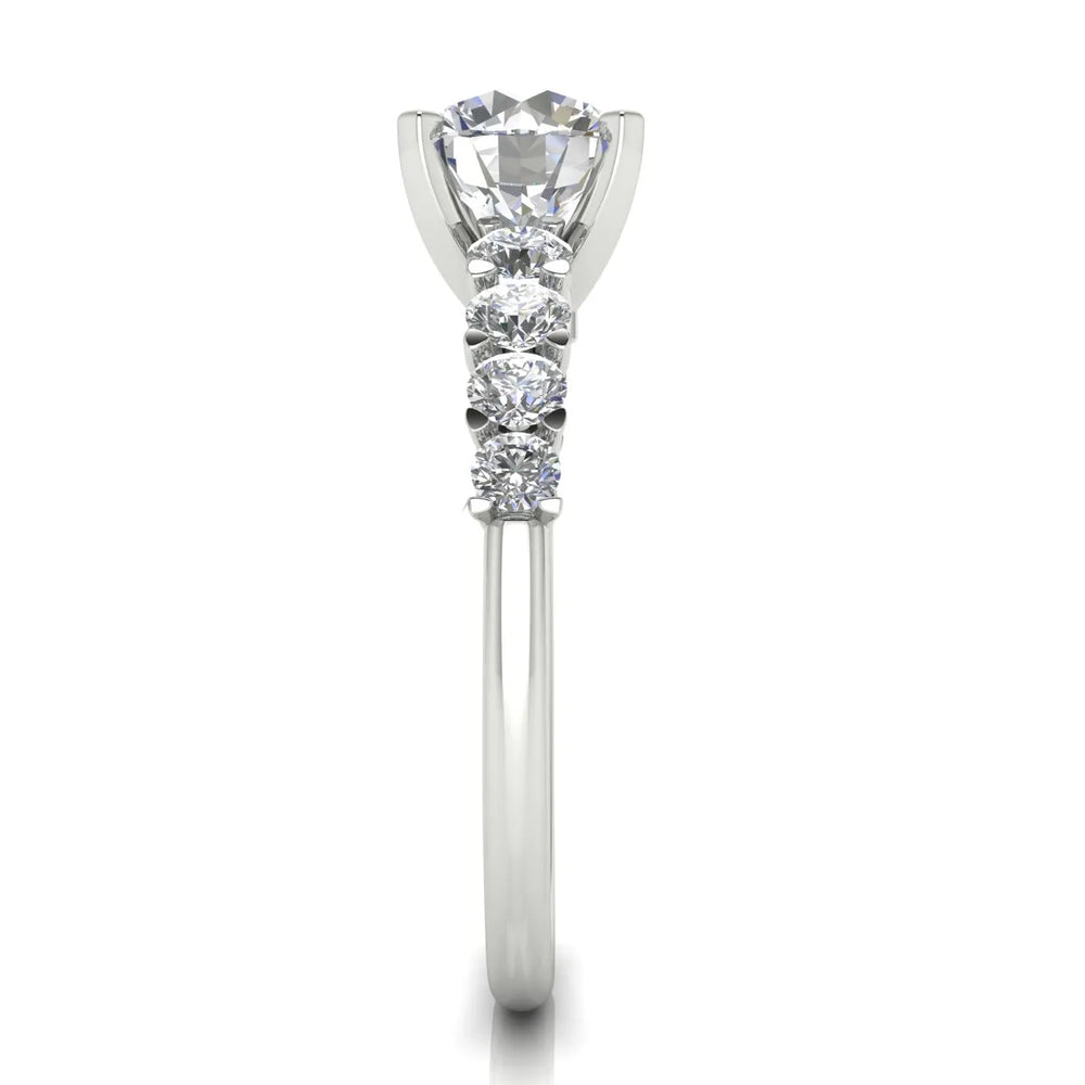 Elegant Solitaire Ring with Graduated Accent Stones