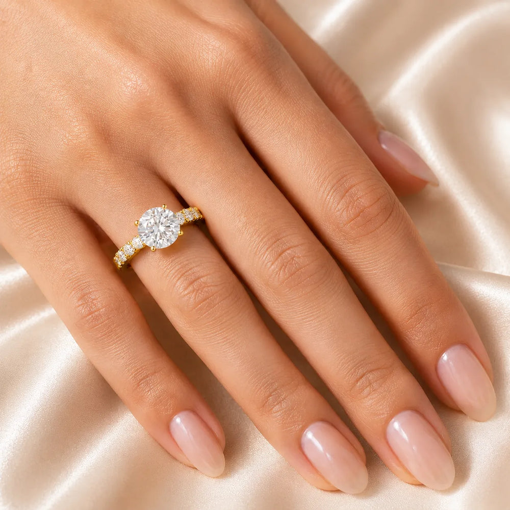 Elegant Solitaire Ring with Graduated Accent Stones