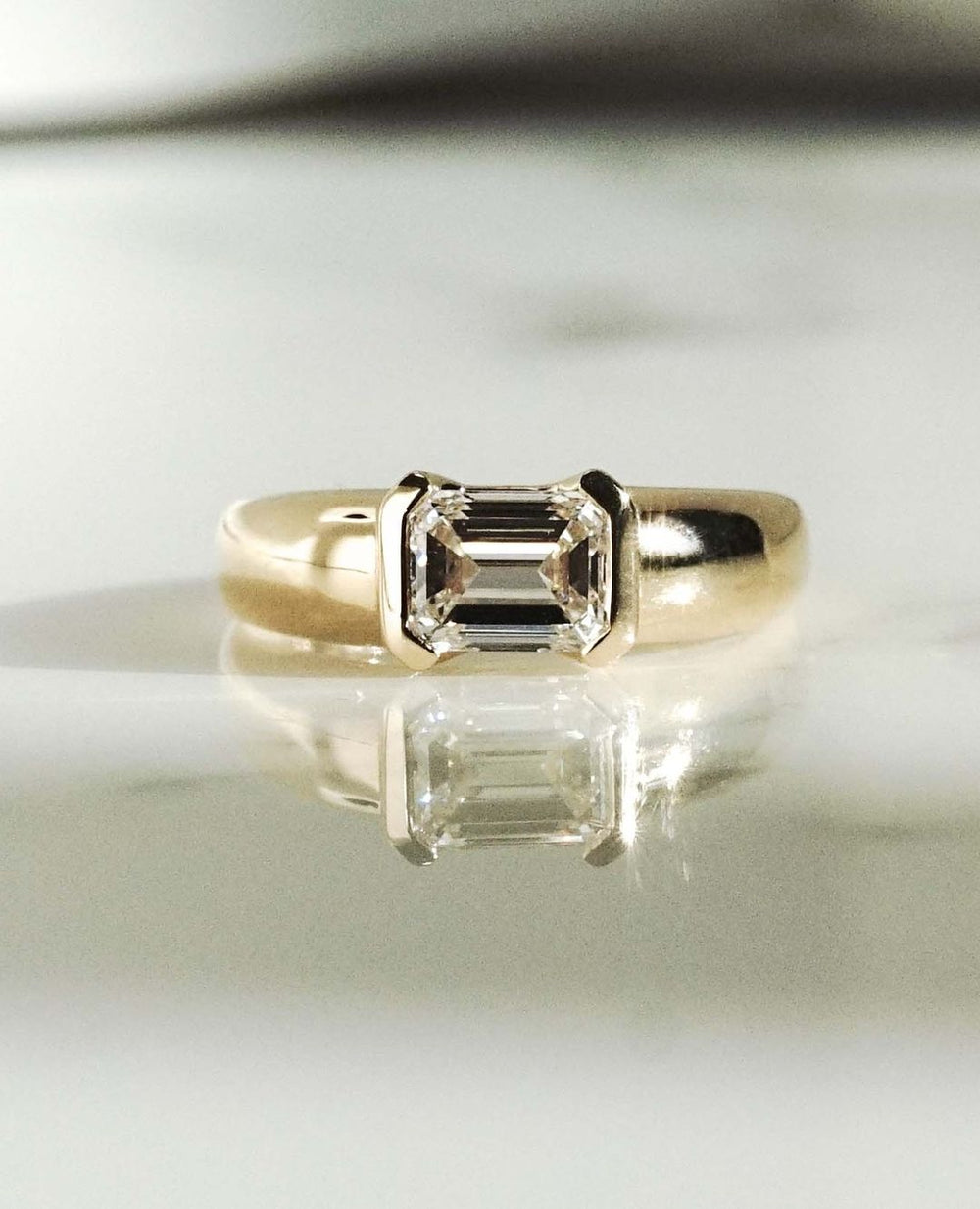 Bezel Set Emerald Cut Labgrown Engagement Ring