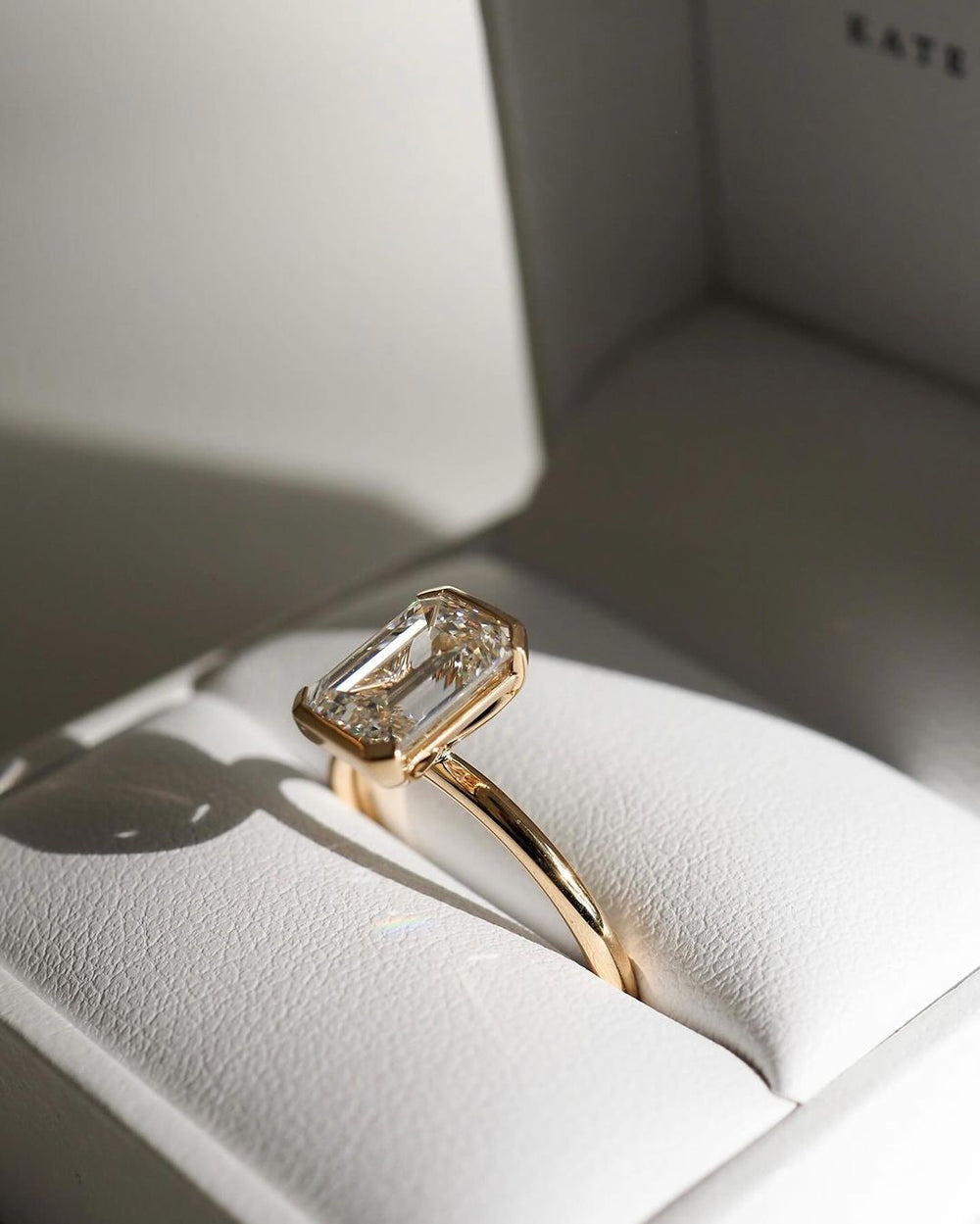 Bezel Set Emerald Cut Labgrown Engagement Ring