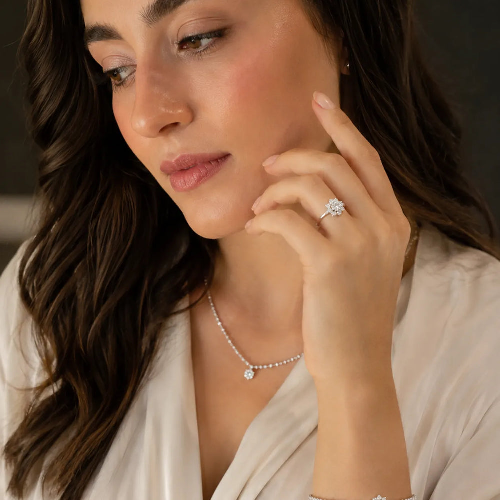 Iris Halo Round Diamond Engagement Ring
