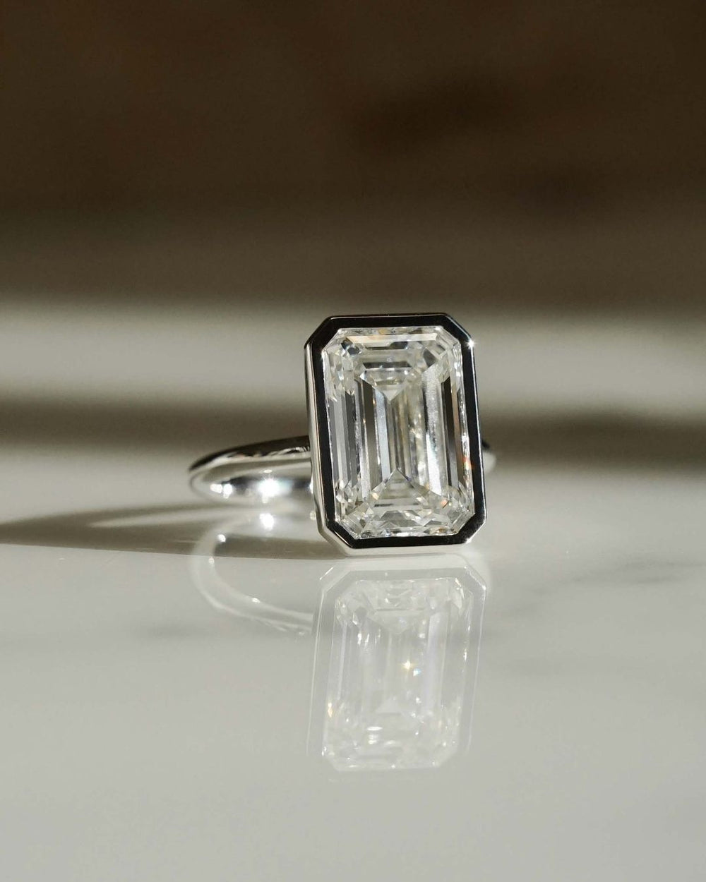 Bezel Set Emerald Cut Labgrown Engagement Ring