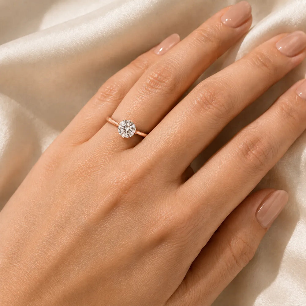 Classic Solitaire Engagement Ring with Refined Setting