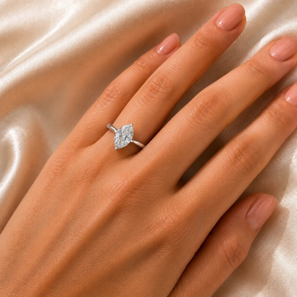 Classic Solitaire Engagement Ring with Refined Setting