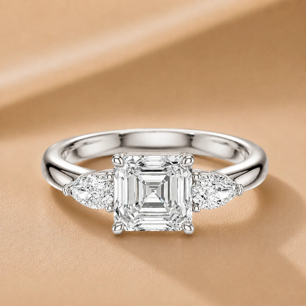 Designer Asscher Diamond Ring with Pear Side Stones