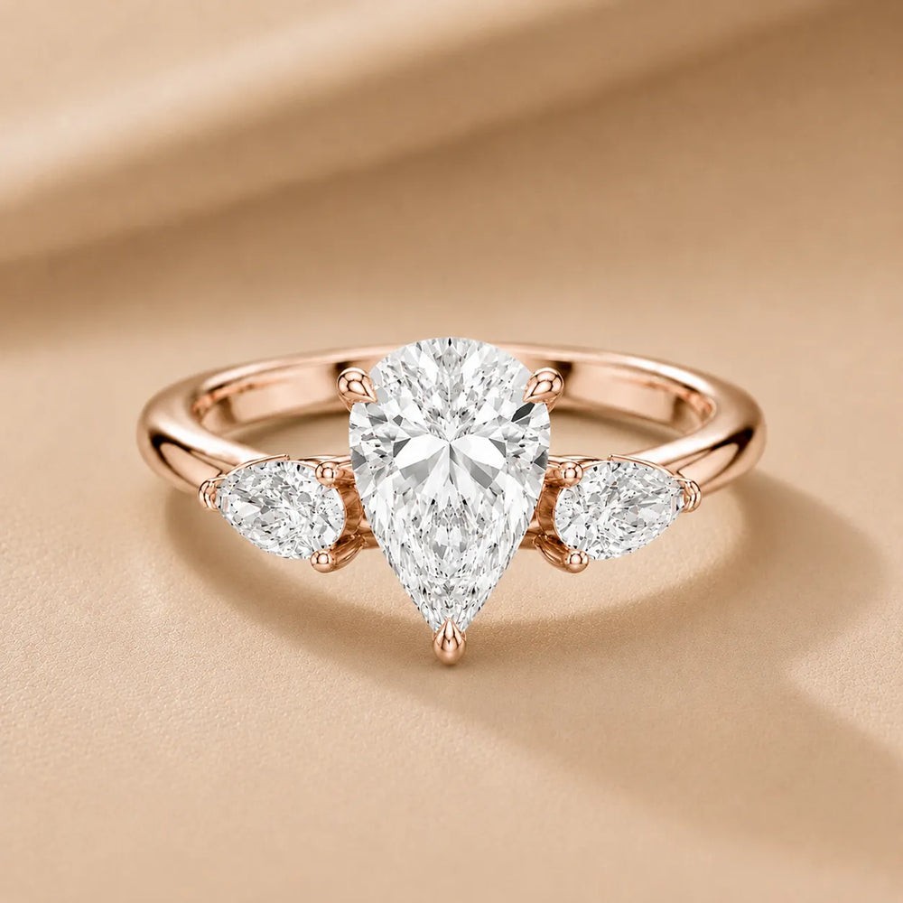 Designer Asscher Diamond Ring with Pear Side Stones
