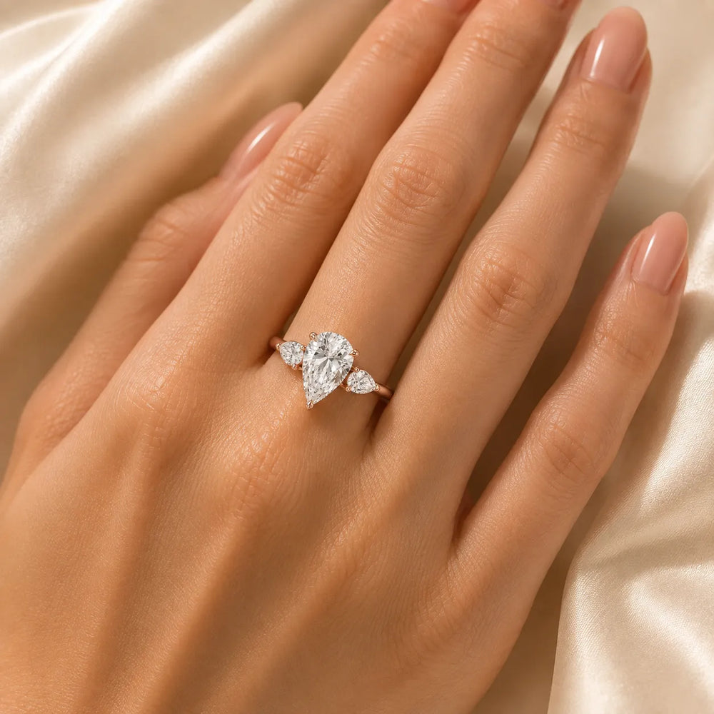 Designer Asscher Diamond Ring with Pear Side Stones