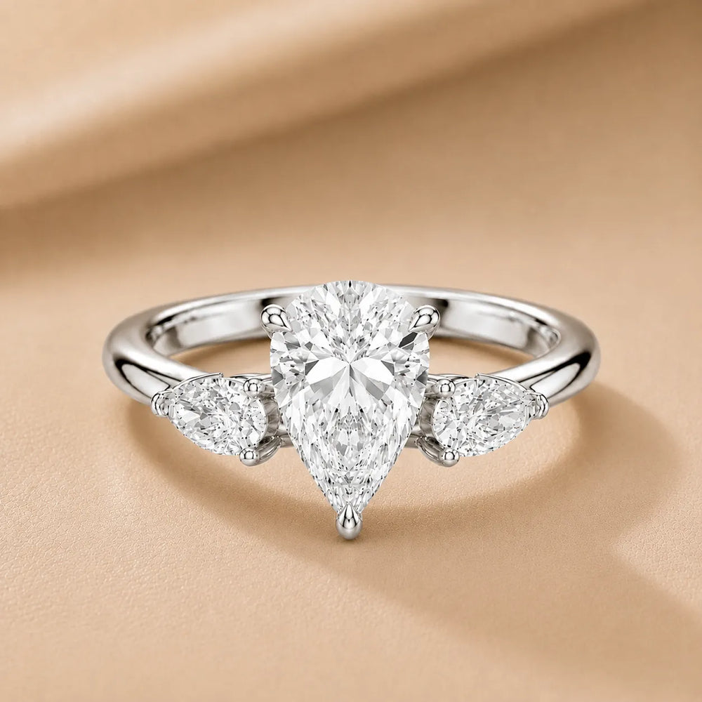 Designer Asscher Diamond Ring with Pear Side Stones