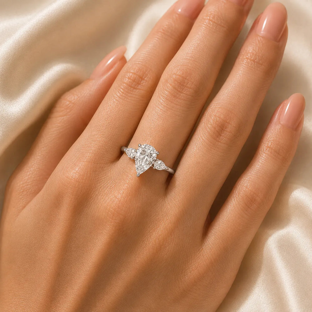 Designer Asscher Diamond Ring with Pear Side Stones