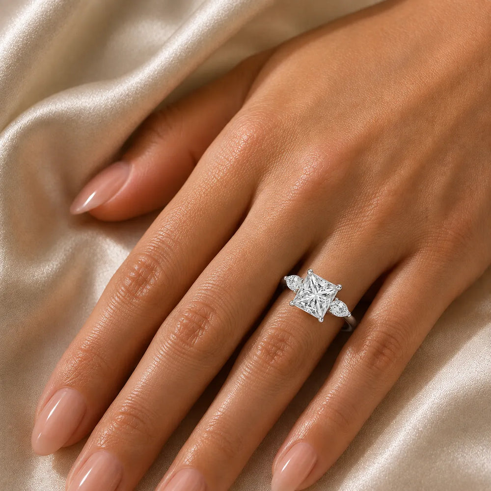 Designer Asscher Diamond Ring with Pear Side Stones