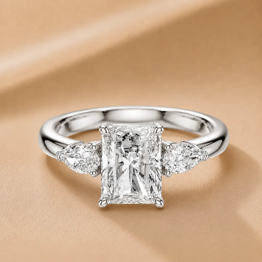 Designer Asscher Diamond Ring with Pear Side Stones