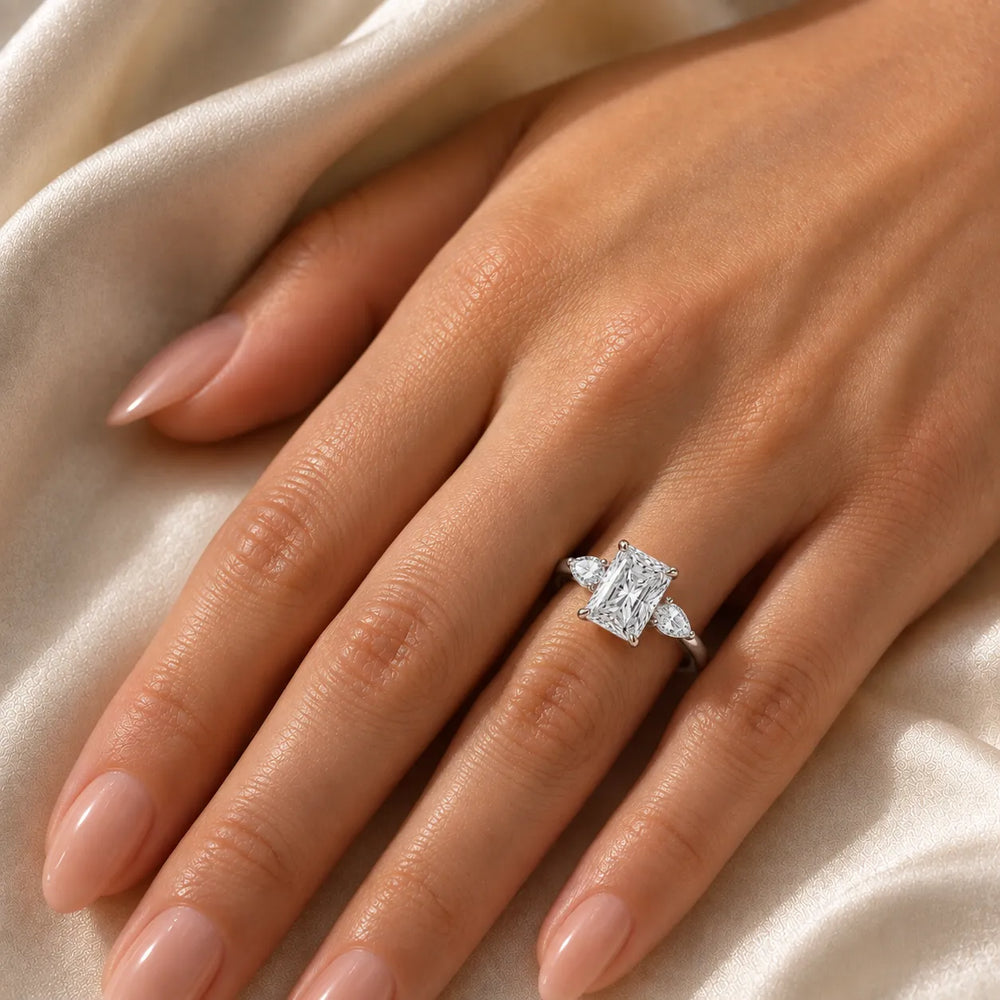 Designer Asscher Diamond Ring with Pear Side Stones