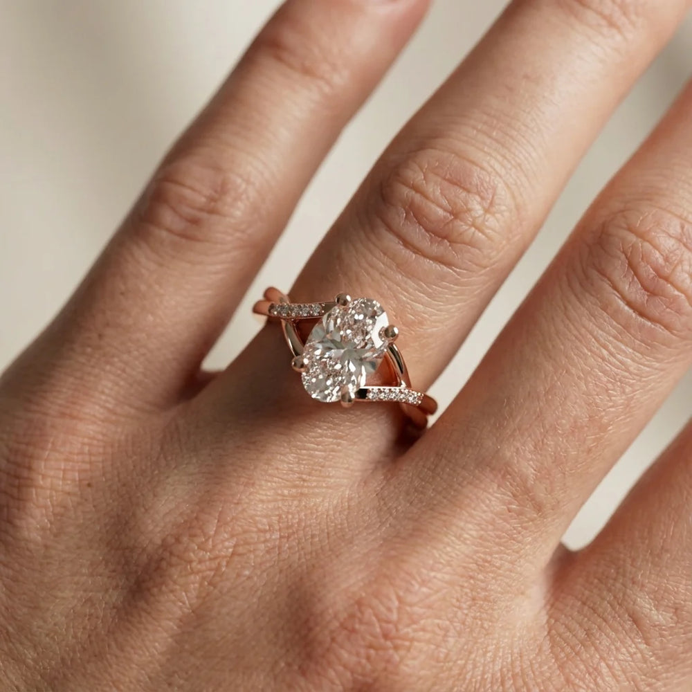 Veronica Twist Side Stone Oval Diamond Engagement Ring