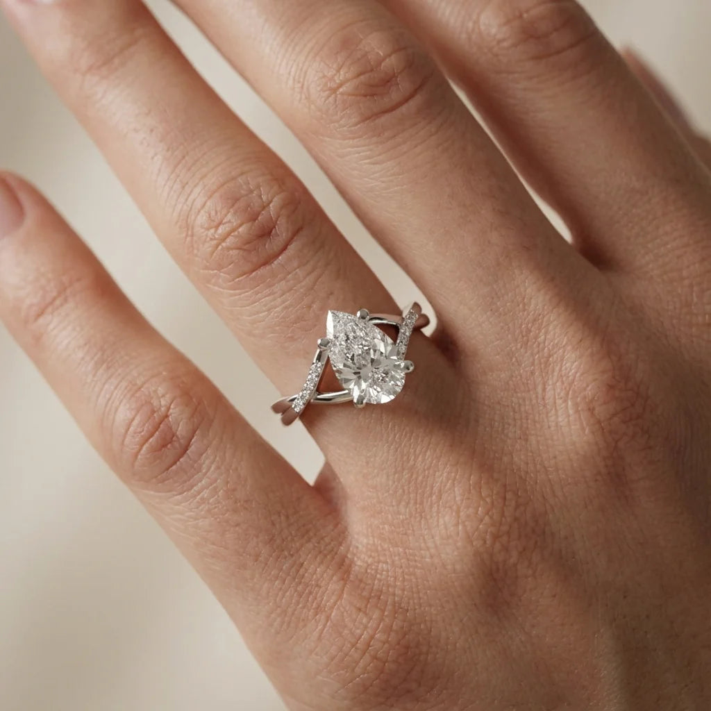 Veronica Twist Side Stone Oval Diamond Engagement Ring