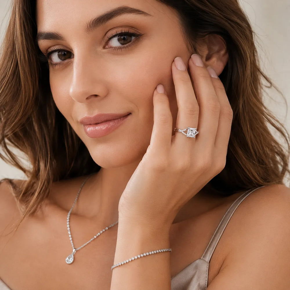Veronica Twist Side Stone Oval Diamond Engagement Ring