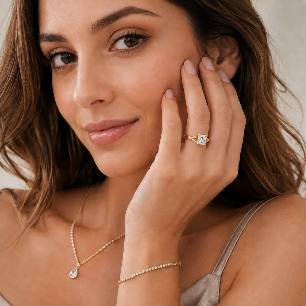 Veronica Twist Side Stone Oval Diamond Engagement Ring