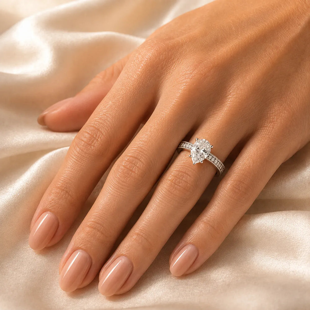 Vintage-Inspired Solitaire Ring with Accent Stones