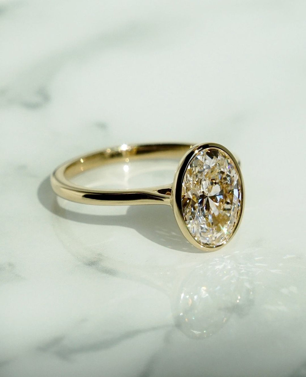 Bezel Set Oval Cut Labgrown Engagement Ring