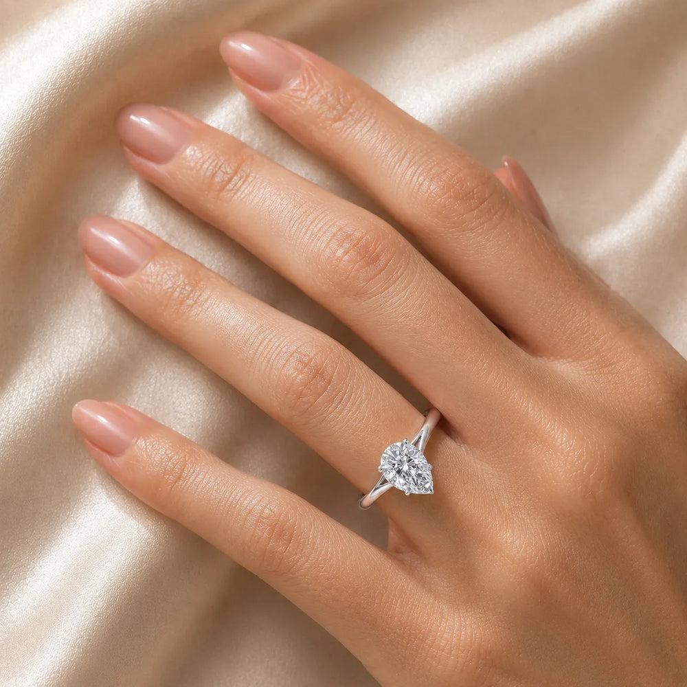 Elegant Solitaire Ring with Tapered