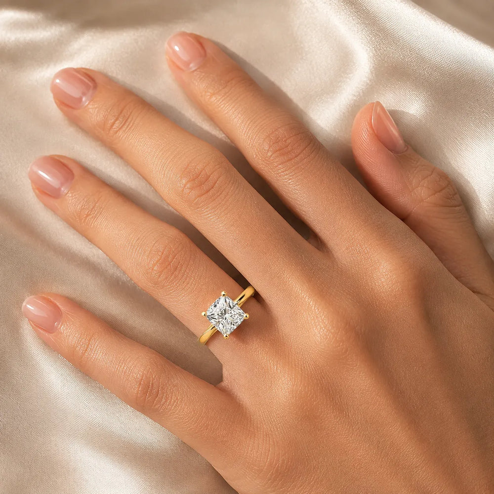 Elegant Solitaire Ring with Tapered