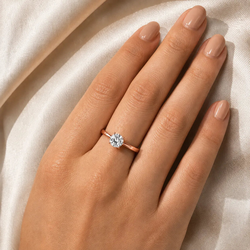 Elegant Solitaire Ring with Tapered