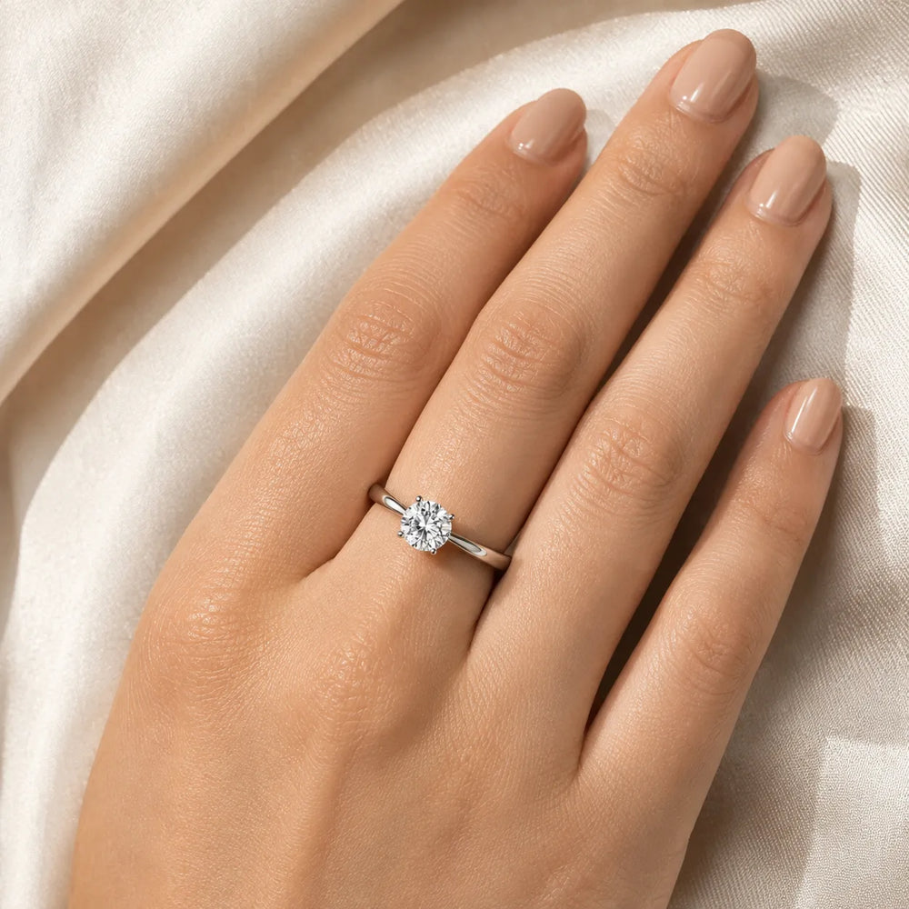 Elegant Solitaire Ring with Tapered