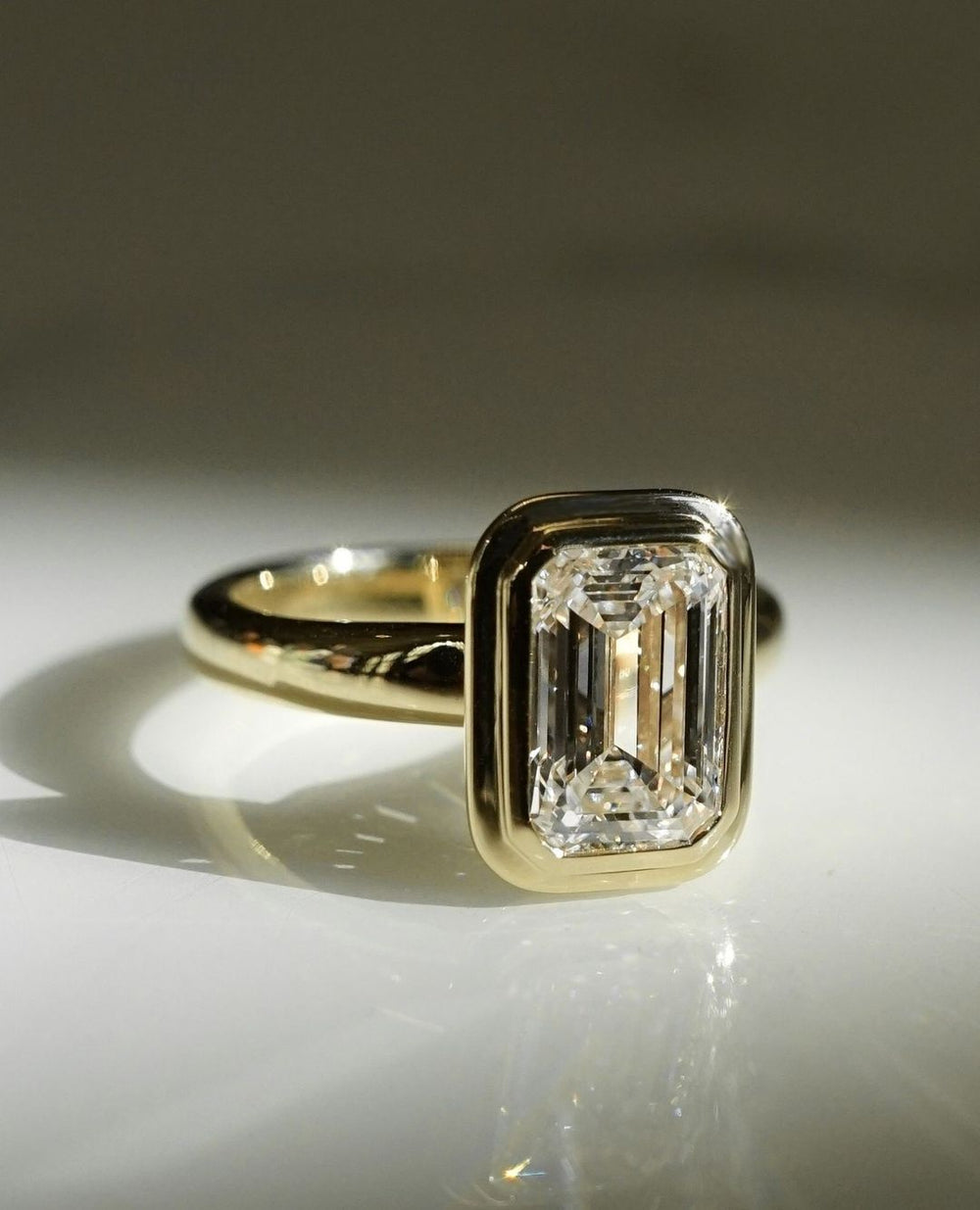 Bezel Set Emerald Cut Labgrown Engagement Ring