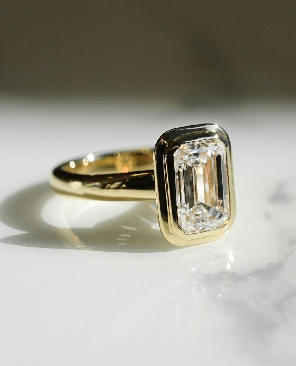 Bezel Set Emerald Cut Labgrown Engagement Ring