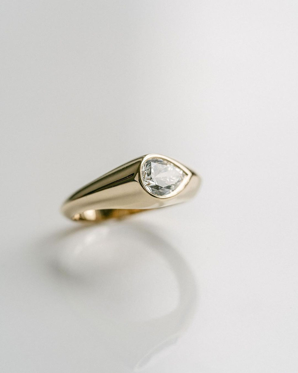 Bezel Set Elongated Pear Cut Labgrown Engagement Ring