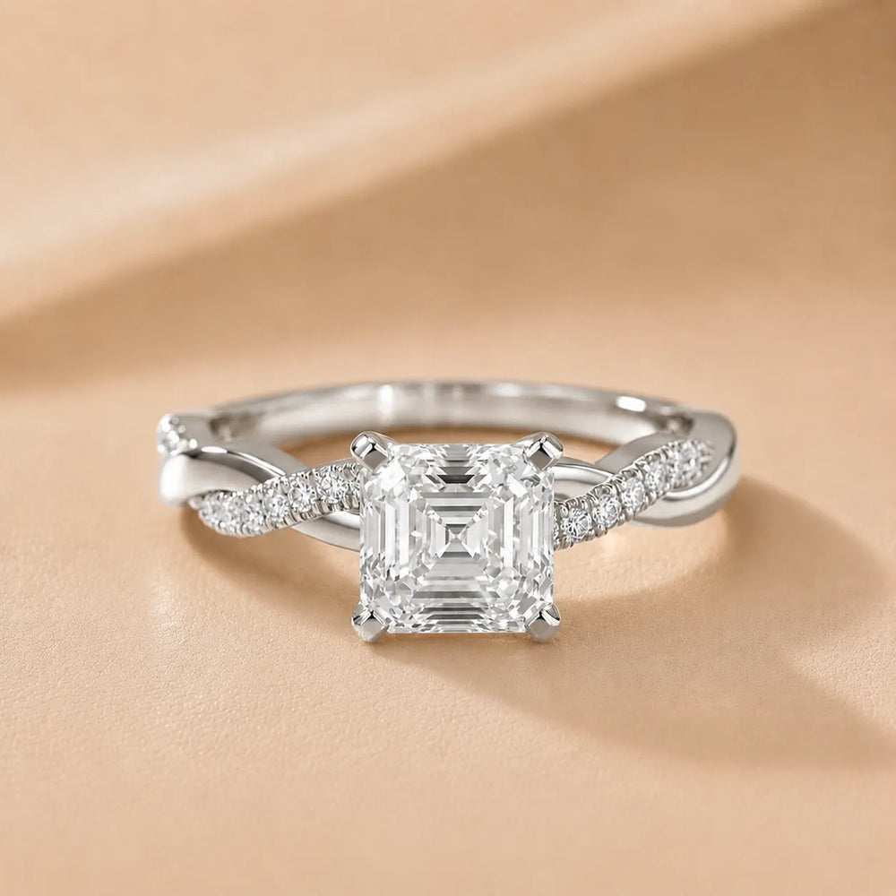 Twisted Side Stone Round Diamond Engagement Ring