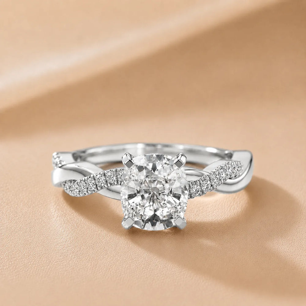 Twisted Side Stone Round Diamond Engagement Ring