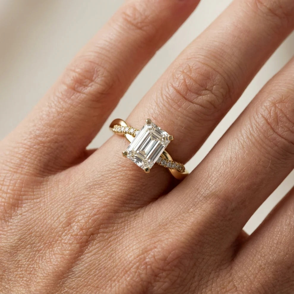 Twisted Side Stone Round Diamond Engagement Ring
